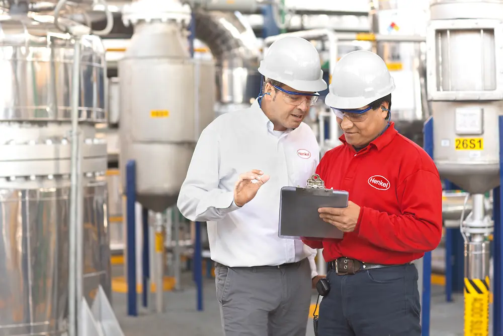 Two engineers proving report in production