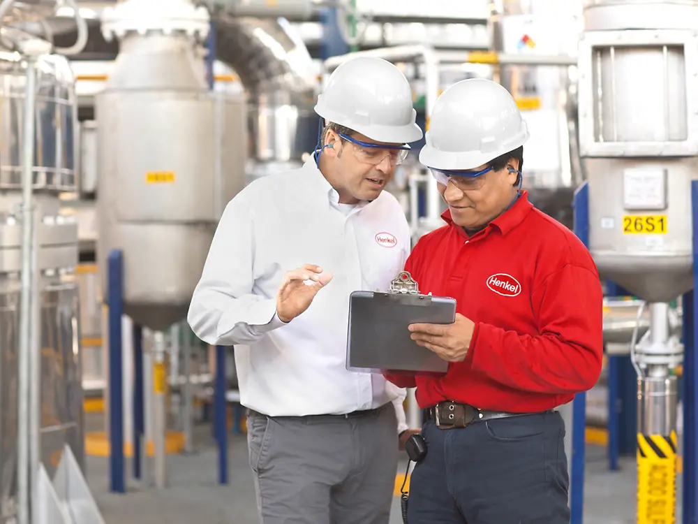 Two engineers proving report in production