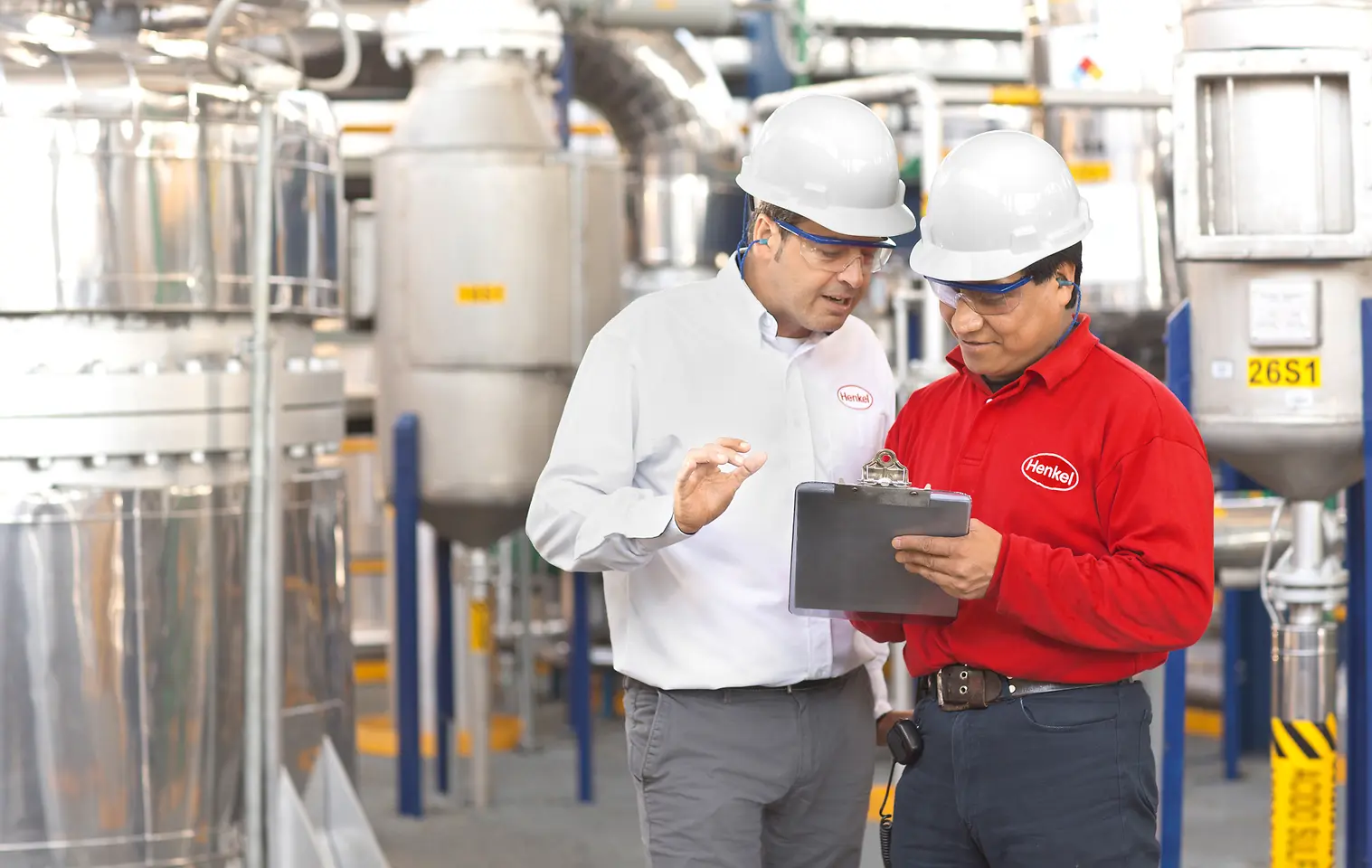 Two engineers proving report in production