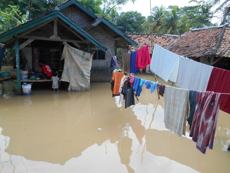 
Houses in the isolated village, partially submerged by the flood