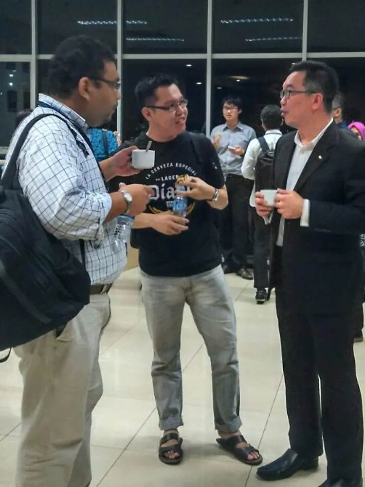 Allan Yong (right) happy to share his experiences running Henkel’s business in emerging market to the students during the coffee break session.