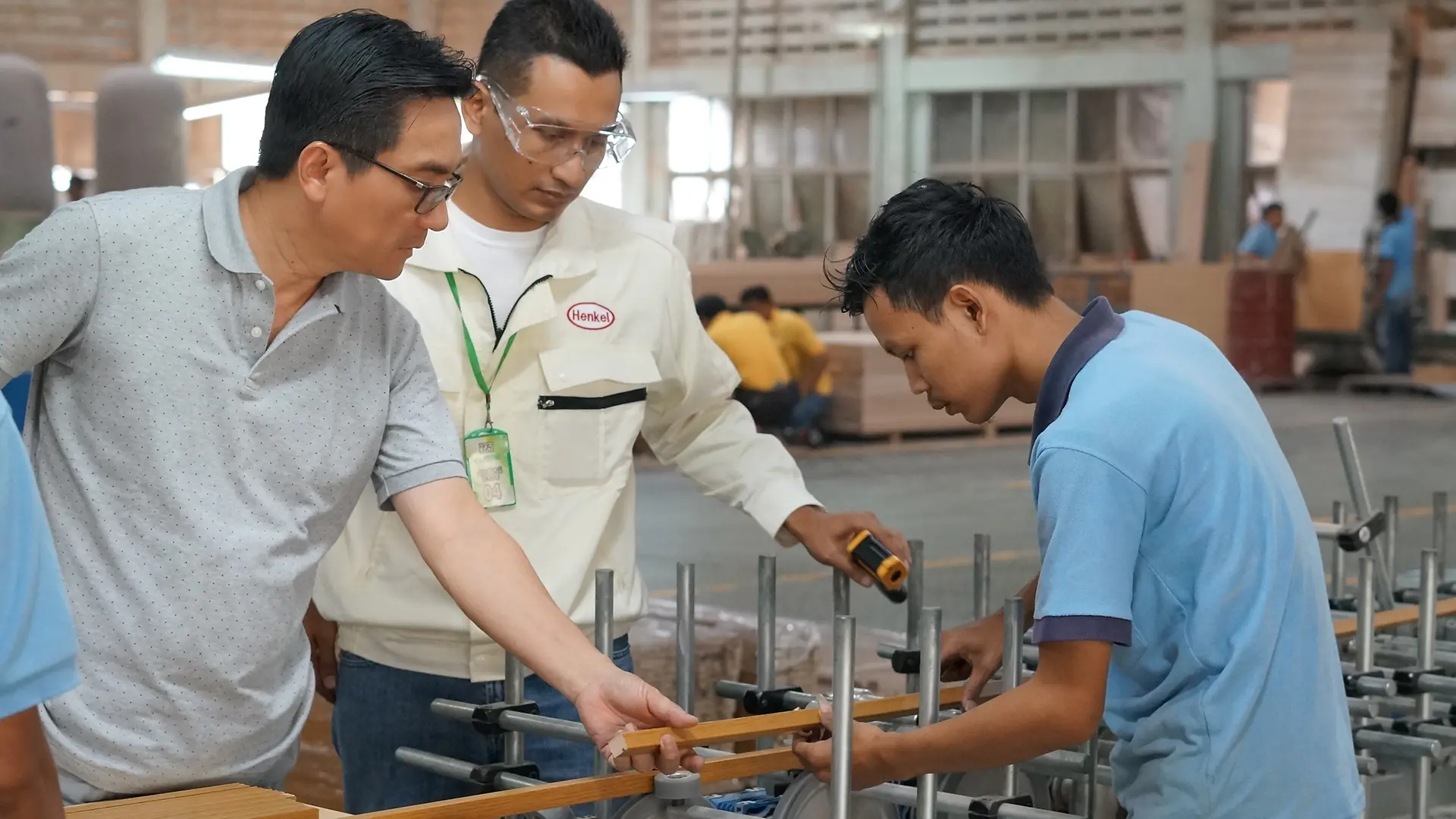 Mr. Ch’ng (left) with Henkel’s expert (middle), doing quality inspection in YBWWI’s plant.